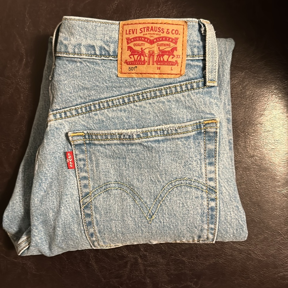 Levi’s 501 Skinny button fly raw hem women’s jeans